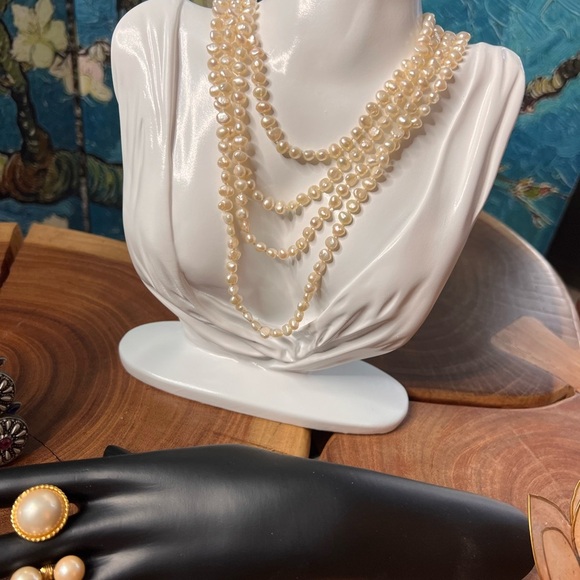 3 strands of baroque, freshwater pearls with three pairs of matching earrings. - Picture 5 of 10